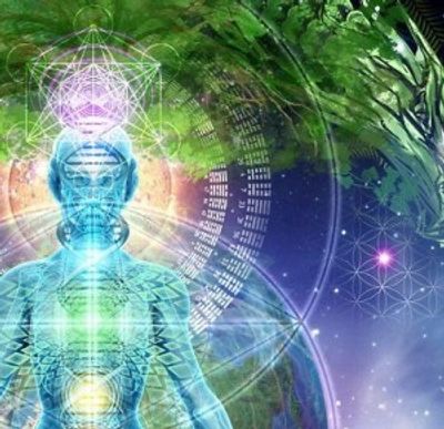 Spiritual figure with glowing chakras and geometric patterns.