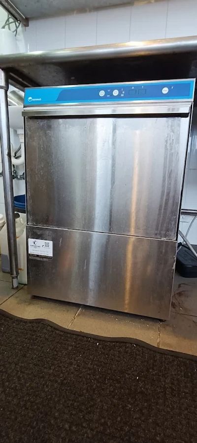 Temperature Tech technician executing catering repairs on a commercial dishwasher in Blacktown.