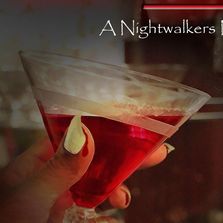 vampire hand holding glass of blood