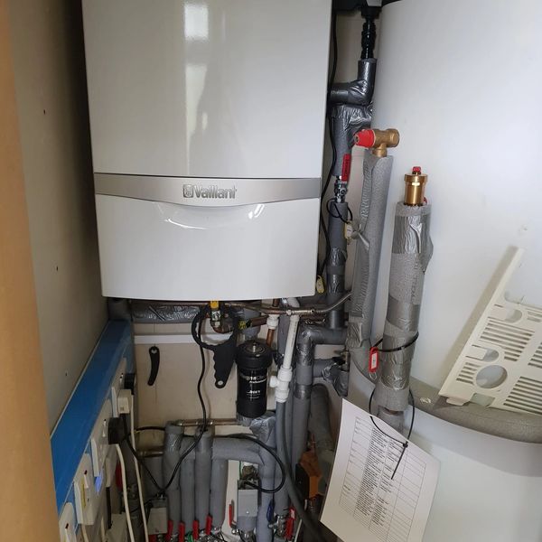 Boiler and water cylinder installation.