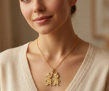 Woman wearing a gold necklace with child pendants.