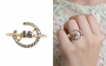 Gold ring with number 15 in a circular design.