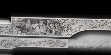 Detailed engraving of a biblical scene on a firearm's metal surface.