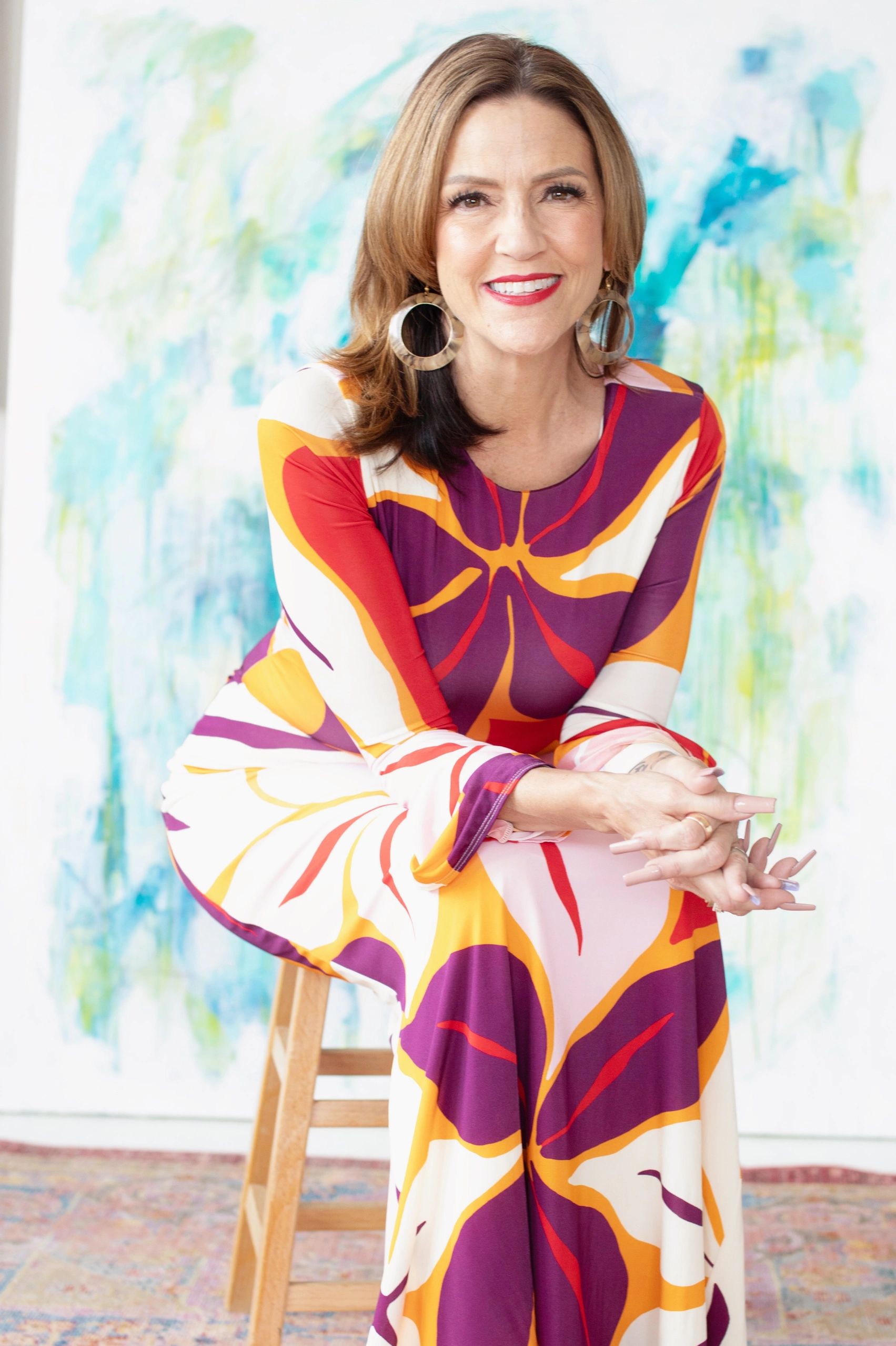 Woman in brightly colored dress.