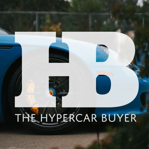 Close-up of a blue sports car wheel with 'The Hypercar Buyer' logo overlay.