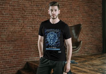 Black T-shirt with a roaring blue lion and the phrase 'Adaptable to the Wild – Startup Leaders Are' 
