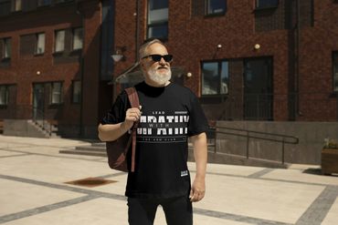Black T-shirt featuring bold white text "Lead with Empathy".