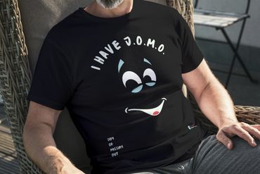 Black T-shirt featuring the phrase 'I Have J.O.M.O. – Joy of Missing Out'