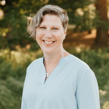 Melanie Noble Smiling Portrait Headshot