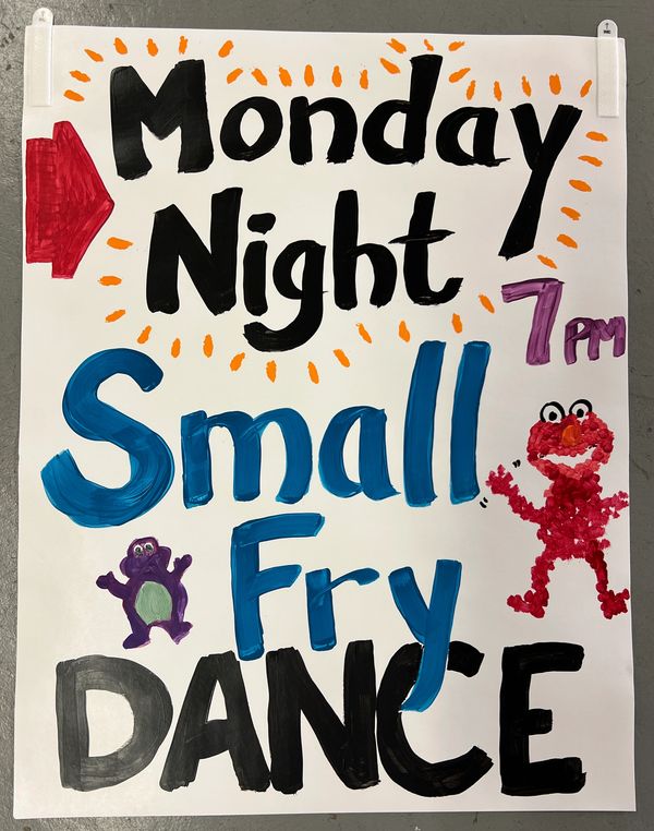 Colorful handmade poster advertising a Monday night small fry dance at 7 PM.
