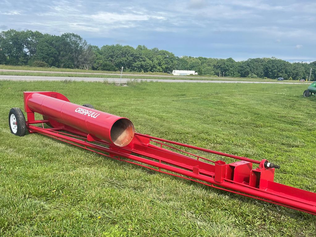 Red Crissafulli pump in a green yard along Highway 7 near Clinton, Missouri