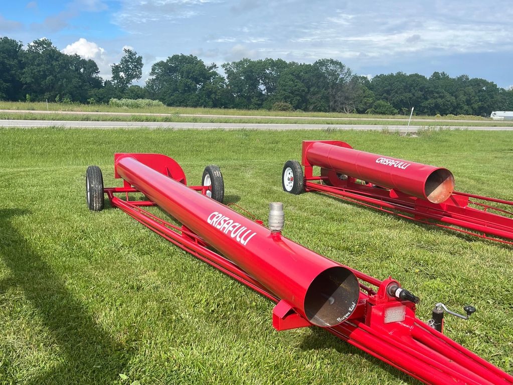 Red Crissafulli pump in a green yard along Highway 7 near Clinton, Missouri