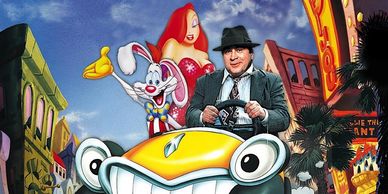 Eddie, Roger Rabbit, Jessica Rabbit are riding in Benny the Cab  on the streets of Toon Town