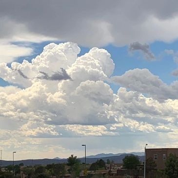 Santa Fe, NM mountains, sky, and clouds.