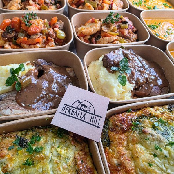 Meals in trays with Bergalia Hill card.