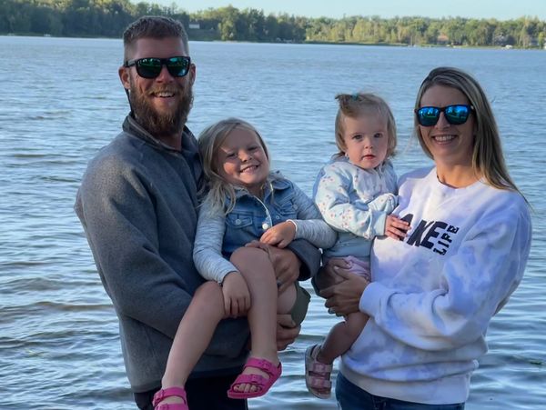 A dedicated father with his family, driven by hard work and a passion for the water