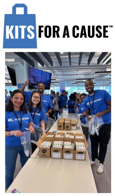 Volunteers assembling kits for a cause.
