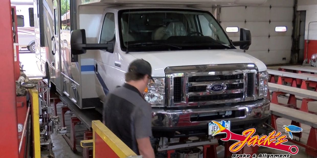 White RV in service bay at Jack's Brake & Alignment