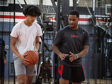 basketball coach doing basketball private training.