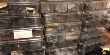 Bins of gun parts for Colts, Smith's, Winchesters and more.
