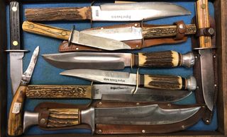 A collage of stag handled Bowie knives
