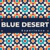 Logo with colorful geometric patterns and text 'Blue Desert Experience'.