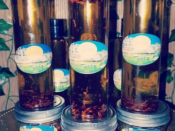 Portuguese Love Massage and Body Oil is infused with dried lilies and has notes of bergamot, jasmine