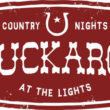 Rustic country night sign with text and horseshoe.