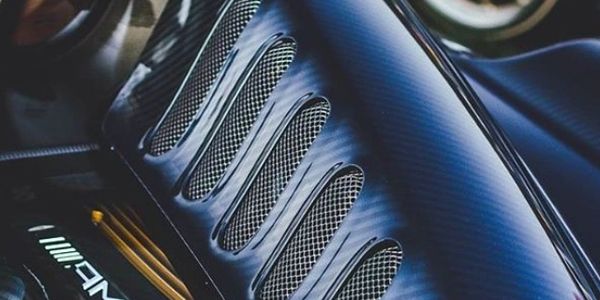 Pagani Huayra with blue carbon fiber twin turbo Mercedes AMG V12 engine with a performance ECU tune