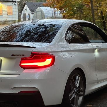 2016 BMW F22 M235i with catless downpipe, Stage 2 ecu tune + H&R lowering springs and burger intake.