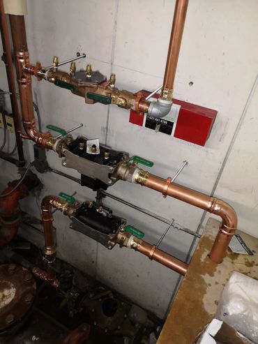 Alt Text: GT plumbing & Renovations installed a backflow preventer for a commercial building 