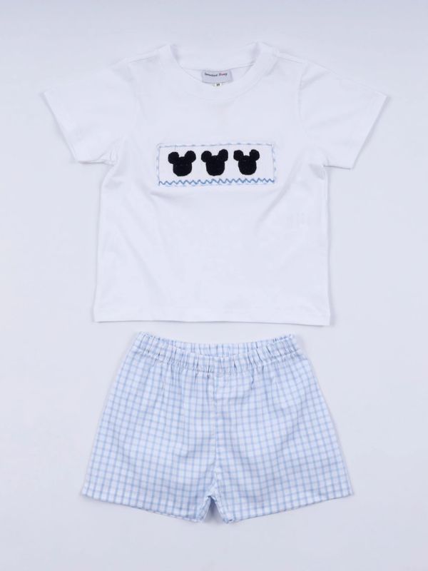 White t-shirt with Mickey Mouse heads and blue checkered shorts for kids.