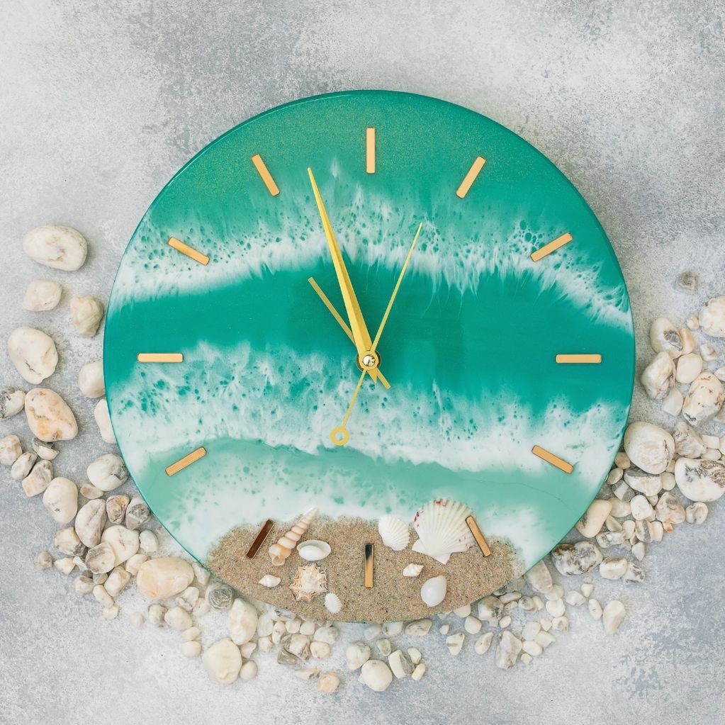 h this handcrafted resin wall clock featuring a stunning ocean wave design, real seashells.