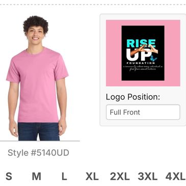 Man wearing a pink T-shirt, style #5140UD, with Rise Up Foundation logo.