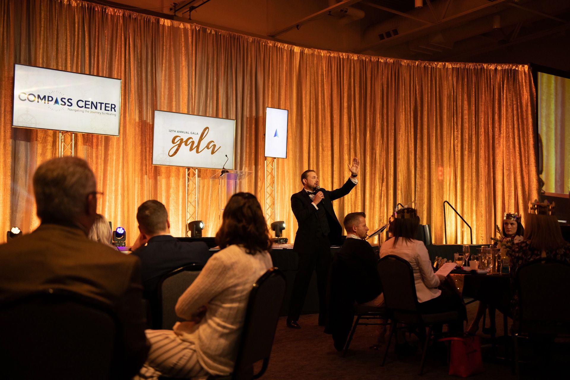 Larsen & Larsen benefit auctioneers leading a charity gala
