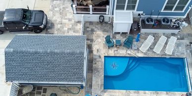Fiberglass pool installed. Backyard fiberglass pool. Small inground pool.