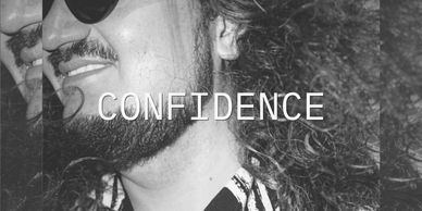 Black and white image with confident man and text.