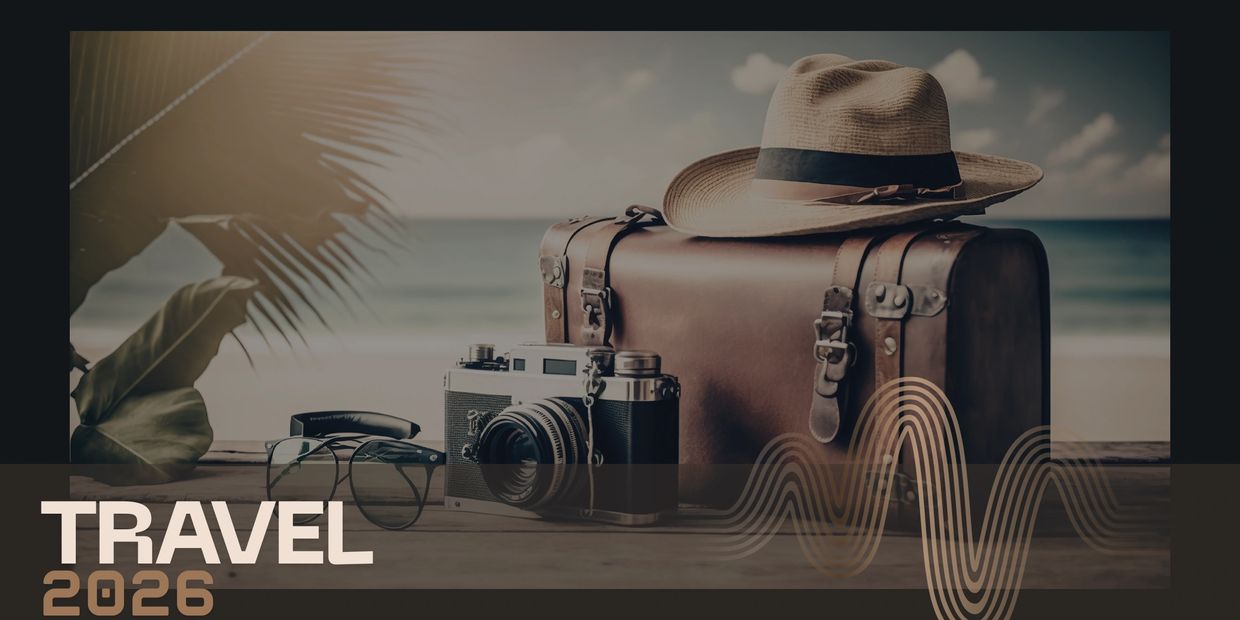 Vintage suitcase, camera, and hat set for travel by the beach in 2026.