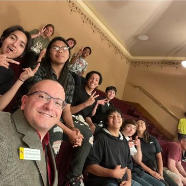 Romero Martinez with a group of students from an alternative school.