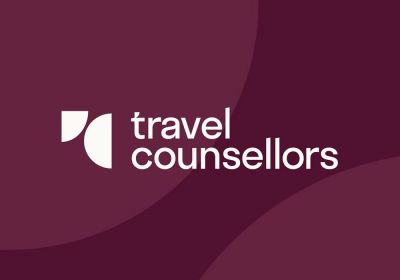 Travel Counsellors company logo on maroon background.