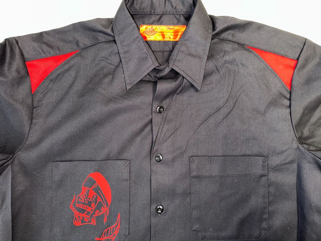 Black and Red collar shirt. 
Oldie but a goodie

$29.99+S&H