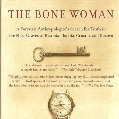 Cover of The Bone Woman by Clea Koff featuring small bones, an antiquated key, and an antique watch face on a. parchment background.