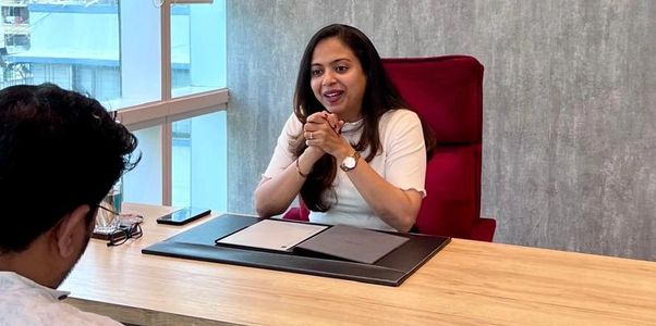 Woman having a conversation in an office.