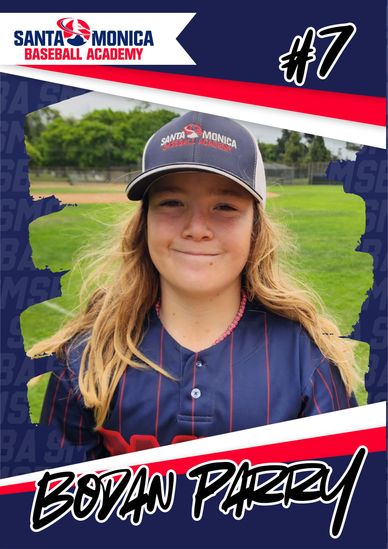 Youth baseball player Boyan Parry in uniform and cap, smiling on a field.