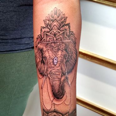 Black and grey realism portrait, hyper detail elephant with ornamental accents.