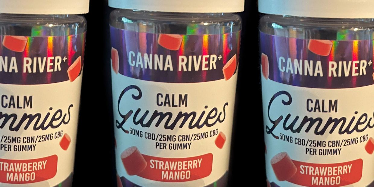 A few bottles of Canna River Clam CBD Gummies.