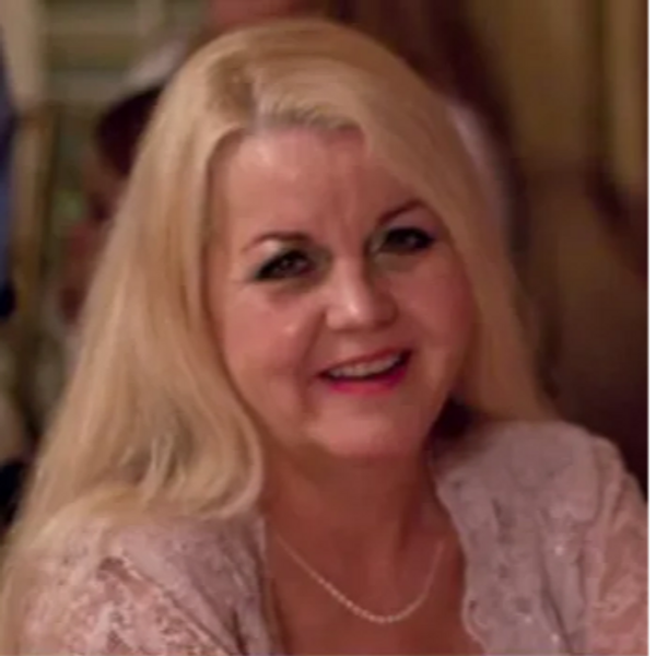 Linda K Berkeley, smiling warmly – providing compassionate psychological support in person or online