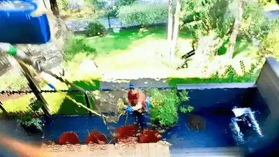 Picture of owner washing windows.