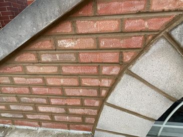 Close-up of brick and stone wall detailing.