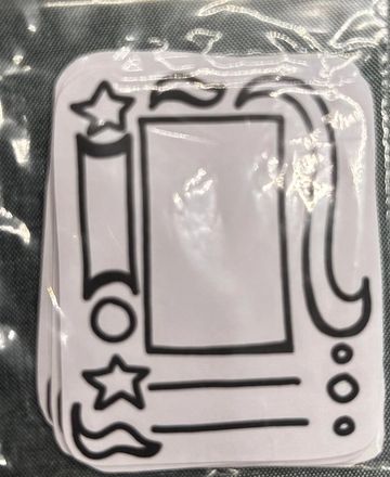 A stack of cards with outlined shapes and designs.